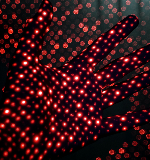Hand with red lights to illustrate McGill artificial intelligence and data science